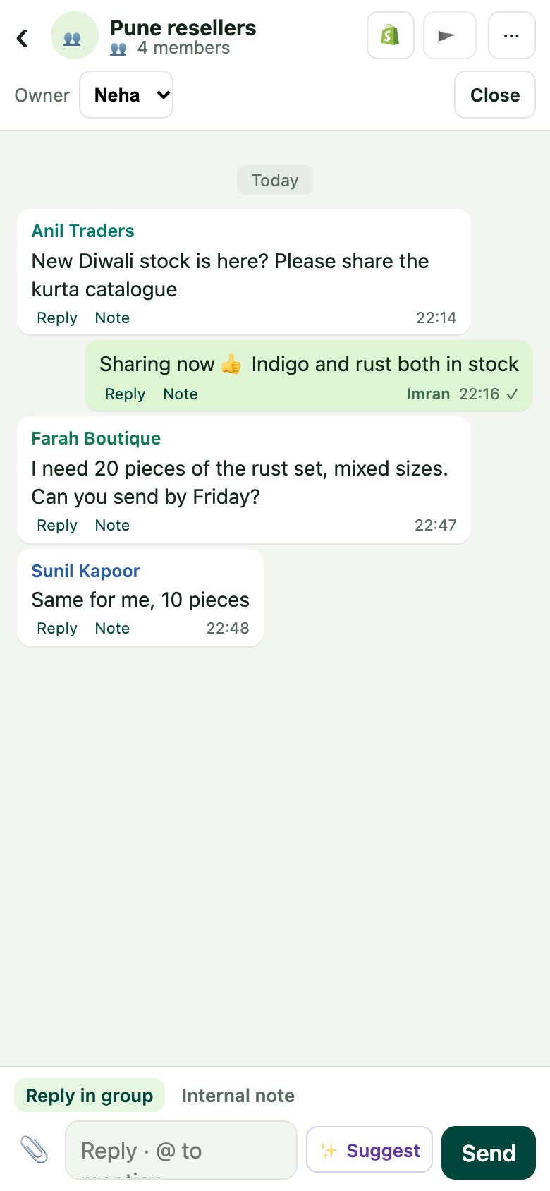 A reseller group open on a phone: messages from three members, each with their name, and a reply from the team
